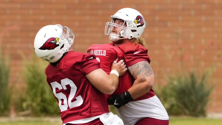 Arizona Cardinals offensive linemen Evan Brown (62) and Hjalte Froholdt (72) during organized team activities in Tempe on May 20, 2024.