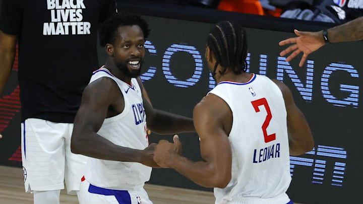 Patrick Beverley and Kawhi Leonard of the LA Clippers against the New Orleans Pelicans at HP Field House at ESPN Wide World Of Sports Complex.