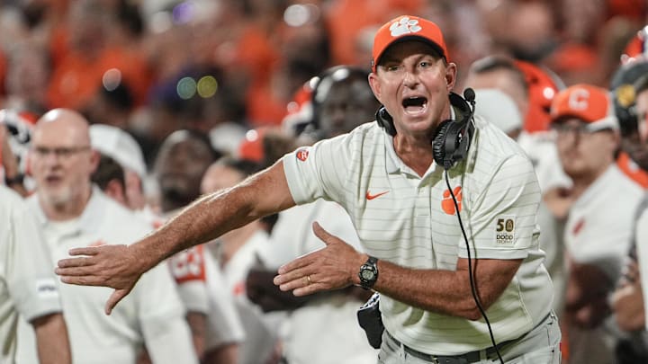 Clemson head coach Dabo Swinney communicates with a referee in the game with Louisiana State University during the second quarter at Memorial Stadium in Clemson, S.C. Saturday, Aug 30, 2025.