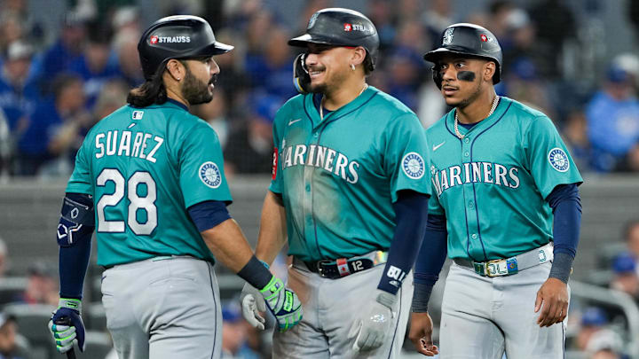 Oct 13, 2025; Toronto, Ontario, CAN; Seattle Mariners infielder Josh Naylor (12) celebrates a two run home run in the seventh inning against the Toronto Blue Jays during game two of the ALCS round for the 2025 MLB playoffs at Rogers Centre. Mandatory Credit: Nick Turchiaro-Imagn Images Oct 13, 2025; Toronto, Ontario, CAN; Seattle Mariners infielder Josh Naylor (12) celebrates a two run home run in the seventh inning against the Toronto Blue Jays during game two of the ALCS round for the 2025 MLB playoffs at Rogers Centre. Mandatory Credit: Nick Turchiaro-Imagn Images