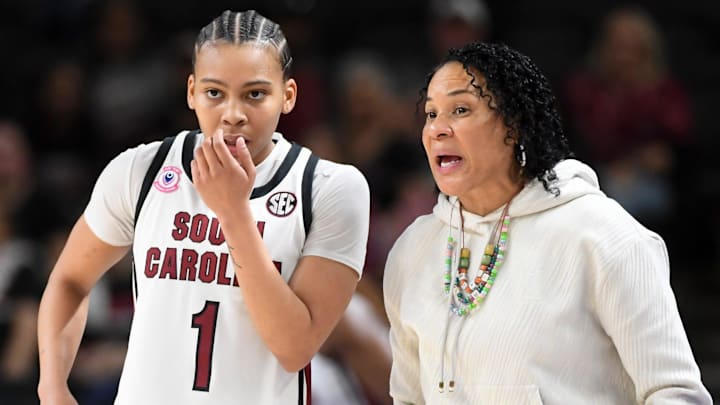 South Carolina Gamecocks guard Maddy McDaniel (1) talks to South Carolina Gamecocks head coach Dawn Staley Friday, March 6, 2026, during the SEC Women's Basketball Tournament quarterfinals game against the Kentucky Wildcats at Bon Secours Wellness Arena in Greenville, South Carolina.