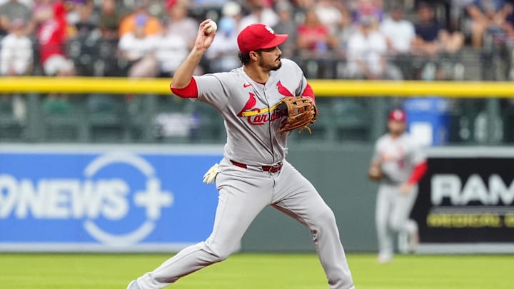 Jul 22, 2025; Denver, Colorado, USA; St. Louis Cardinals third baseman Nolan Arenado (28) fields the ball in the first inning against the Colorado Rockies at Coors Field. Mandatory Credit: Ron Chenoy-Imagn Images Jul 22, 2025; Denver, Colorado, USA; St. Louis Cardinals third baseman Nolan Arenado (28) fields the ball in the first inning against the Colorado Rockies at Coors Field. Mandatory Credit: Ron Chenoy-Imagn Images