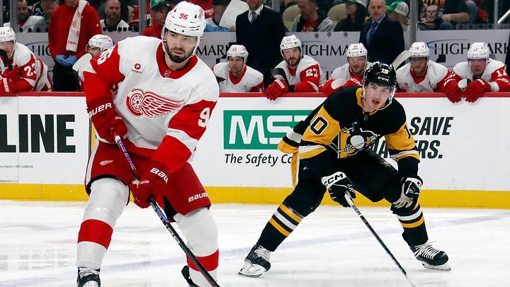 Mar 17, 2024; Pittsburgh, Pennsylvania, USA; Detroit Red Wings defenseman Jake Walman (96) moves the puck against Pittsburgh Penguins left wing Drew O'Connor (10) during the first period at PPG Paints Arena. Mandatory Credit: Charles LeClaire-USA TODAY Sports Mar 17, 2024; Pittsburgh, Pennsylvania, USA; Detroit Red Wings defenseman Jake Walman (96) moves the puck against Pittsburgh Penguins left wing Drew O'Connor (10) during the first period at PPG Paints Arena. Mandatory Credit: Charles LeClaire-USA TODAY Sports