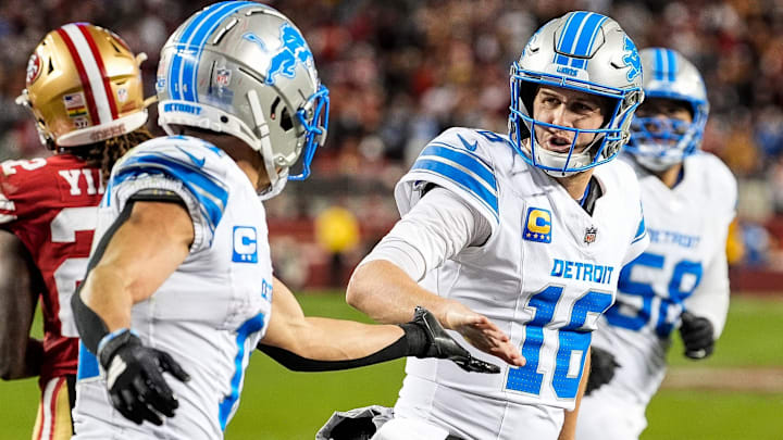Detroit Lions quarterback Jared Goff (16) shakes hands with wide receiver Amon-Ra St. Brown (14). Detroit Lions quarterback Jared Goff (16) shakes hands with wide receiver Amon-Ra St. Brown (14).