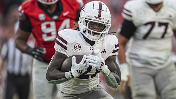 Oct 12, 2024; Athens, Georgia, USA; Mississippi State Bulldogs running back Davon Booth (21) runs the ball against the Georgia Bulldogs at Sanford Stadium. Mandatory Credit: Dale Zanine-Imagn Images