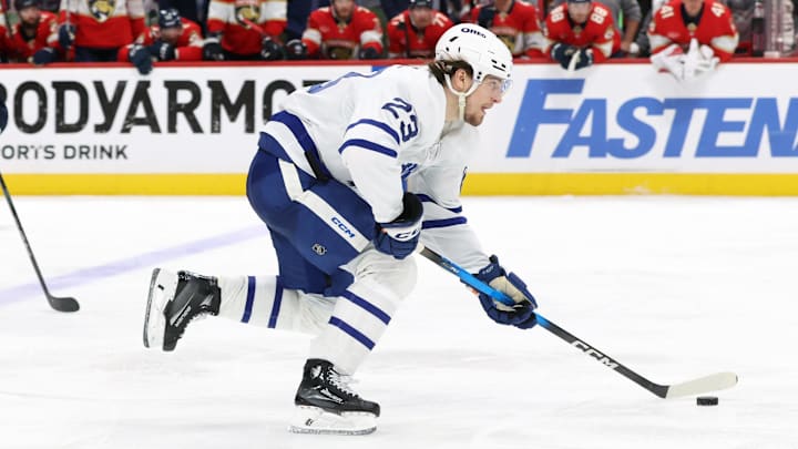 May 11, 2025; Sunrise, Florida, USA; Toronto Maple Leafs left wing Matthew Knies (23) skates with the puck against the Florida Panthers during the third period in game four of the second round of the 2025 Stanley Cup Playoffs at Amerant Bank Arena. Mandatory Credit: Kim Klement Neitzel-Imagn Images