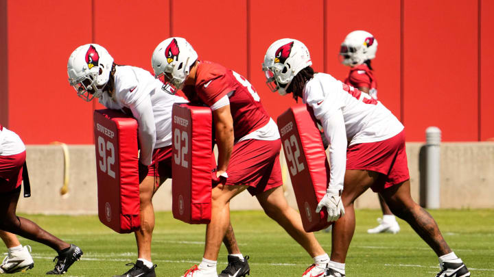 Arizona Cardinals defensive tackle Dante Stills (right) during minicamp at Dignity Health Training Center on June 11, 2024. Arizona Cardinals defensive tackle Dante Stills (right) during minicamp at Dignity Health Training Center on June 11, 2024.