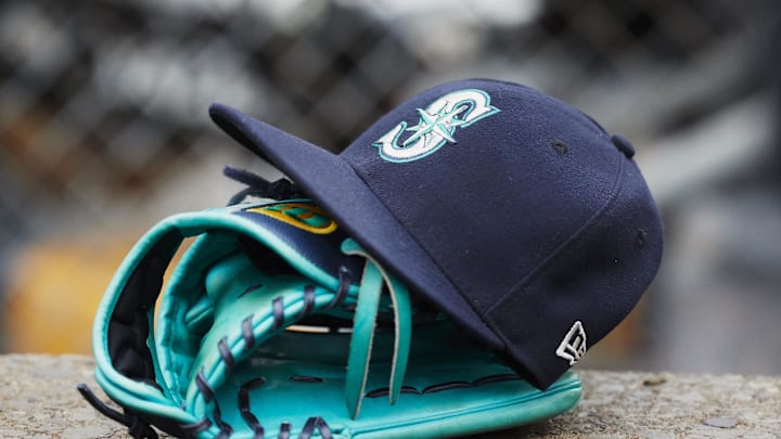 May 12, 2018; Detroit, MI, USA; Hat and glove of Seattle Mariners center fielder Dee Gordon (9) sits in dugout during the third inning against the Detroit Tigers at Comerica Park. Mandatory Credit: Rick Osentoski-Imagn Images
