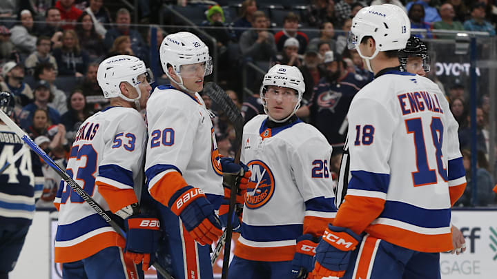 Apr 17, 2025; Columbus, Ohio, USA; New York Islanders right wing Hudson Fasching (20) celebrates his goal against the Columbus Blue Jackets during the third period at Nationwide Arena. Mandatory Credit: Russell LaBounty-Imagn Images