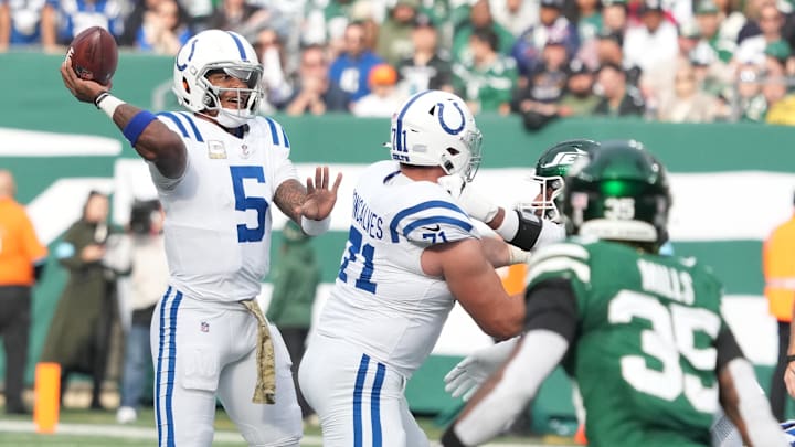 Nov 17, 2024; East Rutherford, New Jersey, USA; Indianapolis Colts quarterback Anthony Richardson (5) throws against the New York Jets during the first half at MetLife Stadium. Mandatory Credit: Robert Deutsch-Imagn Images