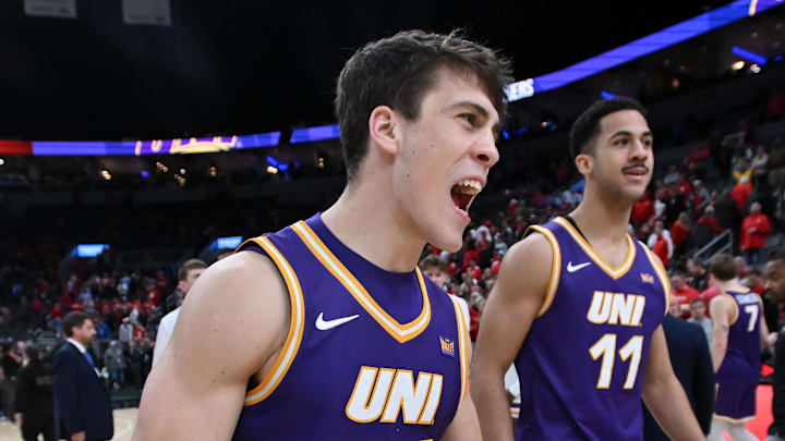 Mar 7, 2026; St. Louis, MO, USA;  Northern Iowa Panthers forward Tristan Smith (14) and Ismael Diouf (11) celebrate their 73-69 win over the Bradley Braves during the second half at Enterprise Center. Mandatory Credit: Ron Johnson-Imagn Images