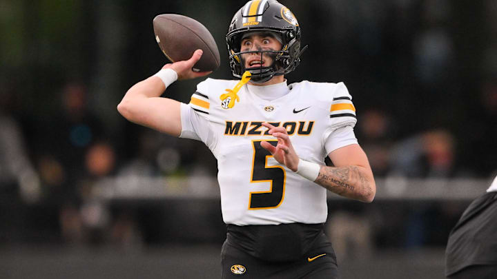 Oct 25, 2025; Nashville, Tennessee, USA;  Missouri Tigers quarterback Matt Zollers (5) throws a pass against the Vanderbilt Commodores during the second half at FirstBank Stadium. Mandatory Credit: Steve Roberts-Imagn Images