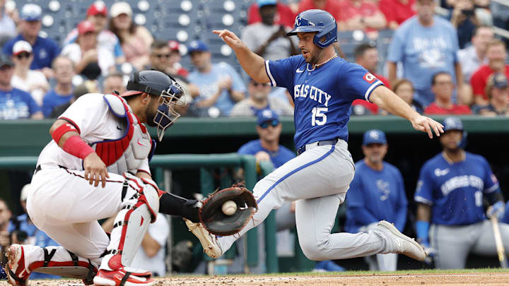 Sep 26, 2024; Washington, District of Columbia, USA; Kansas City Royals shortstop Paul DeJong (15) scores a run ahead of a tag by Washington Nationals catcher Keibert Ruiz (20) during the fourth inning at Nationals Park. Mandatory Credit: Geoff Burke-Imagn Images Sep 26, 2024; Washington, District of Columbia, USA; Kansas City Royals shortstop Paul DeJong (15) scores a run ahead of a tag by Washington Nationals catcher Keibert Ruiz (20) during the fourth inning at Nationals Park. Mandatory Credit: Geoff Burke-Imagn Images