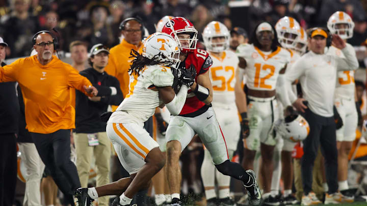 Nov 16, 2024; Athens, Georgia, USA; Georgia Bulldogs wide receiver London Humphreys (16) catches a pass in front of Tennessee Volunteers defensive back Jermod McCoy (3) in the fourth quarter at Sanford Stadium. Mandatory Credit: Brett Davis-Imagn Images

