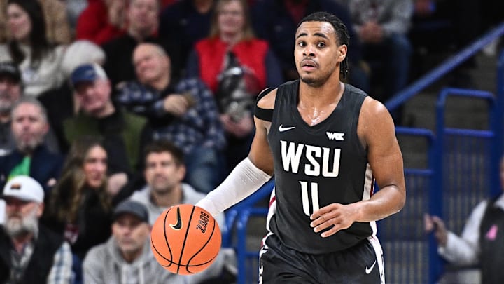 Feb 10, 2026; Spokane, Washington, USA; Washington State Cougars guard Jerone Morton (11) brings the ball up court against the Gonzaga Bulldogs in the second half at McCarthey Athletic Center. Mandatory Credit: James Snook-Imagn Images