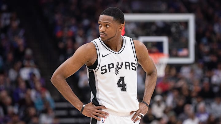 Mar 7, 2025; Sacramento, California, USA; San Antonio Spurs guard De'Aaron Fox (4) looks on during the first quarter of the game against the Sacramento Kings at Golden 1 Center. Mandatory Credit: Ed Szczepanski-Imagn Images
