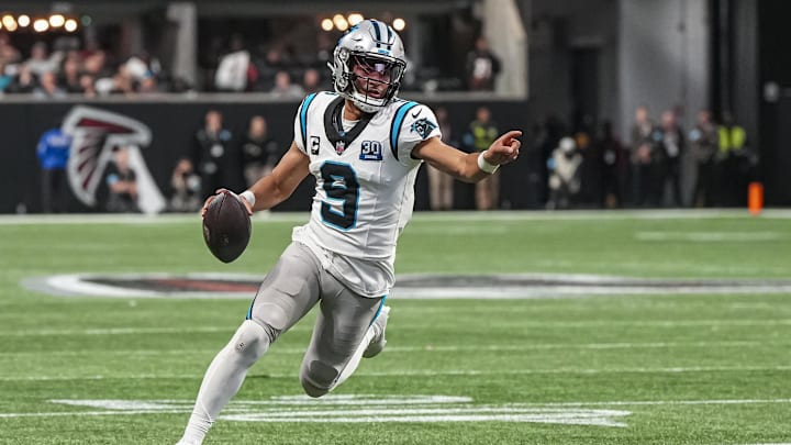 Jan 5, 2025; Atlanta, Georgia, USA; Carolina Panthers quarterback Bryce Young (9) runs for a touchdown against the Atlanta Falcons during the second half at Mercedes-Benz Stadium. Mandatory Credit: Dale Zanine-Imagn Images