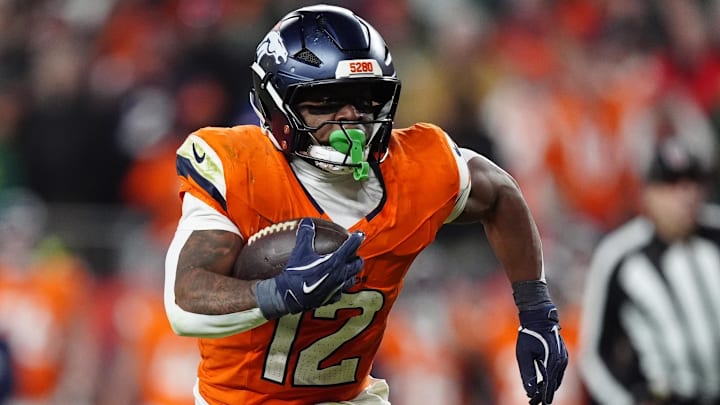 Dec 14, 2025; Denver, Colorado, USA; Denver Broncos running back RJ Harvey (12) runs for a gain during the fourth quarter against the Green Bay Packers at Empower Field at Mile High. Dec 14, 2025; Denver, Colorado, USA; Denver Broncos running back RJ Harvey (12) runs for a gain during the fourth quarter against the Green Bay Packers at Empower Field at Mile High.
