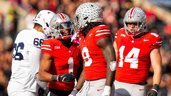 Ohio State Buckeyes cornerback Davison Igbinosun (1) and linebacker Arvell Reese (8) celebrate after Reese sacked the quarterback in the second half of the college football game at Ohio Stadium on Saturday, Nov. 1, 2025 in Columbus, Ohio.