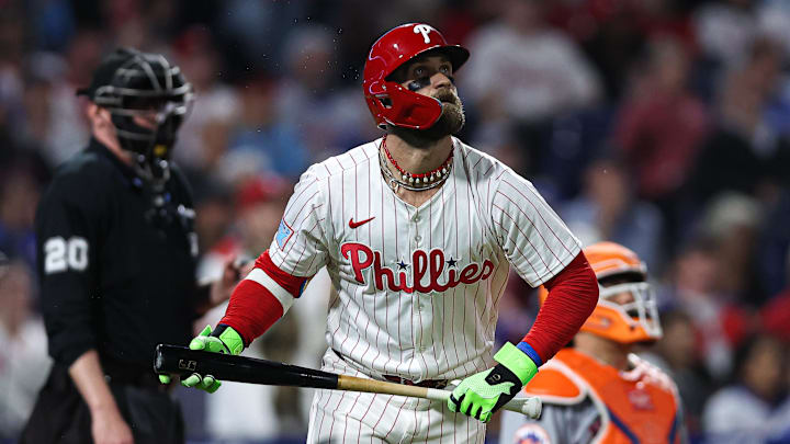 Philadelphia Phillies first base Bryce Harper (3) watches his ball clear the wall for a home run against the New York Mets during the seventh inning at Citizens Bank Park. 