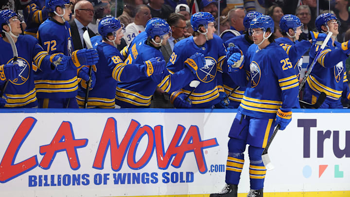 Mar 14, 2026; Buffalo, New York, USA;  Buffalo Sabres defenseman Owen Power (25) celebrates his goal with teammates during the first period against the Toronto Maple Leafs at KeyBank Center. Mandatory Credit: Timothy T. Ludwig-Imagn Images