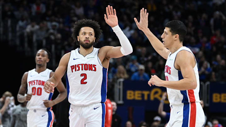 Nov 10, 2024; Detroit, Michigan, USA;  Detroit Pistons guard Cade Cunningham (2) celebrates with forward Simone Fontecchio (19) after making a three-point shot against the Houston Rockets in the second quarter at Little Caesars Arena. Mandatory Credit: Lon Horwedel-Imagn Images