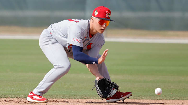 Feb 16, 2026; Jupiter, FL, USA;  St. Louis Cardinals infielder JJ Wetherholt (77) fields the ball during spring training workouts at Roger Dean Stadium. Mandatory Credit: Reinhold Matay-Imagn Images