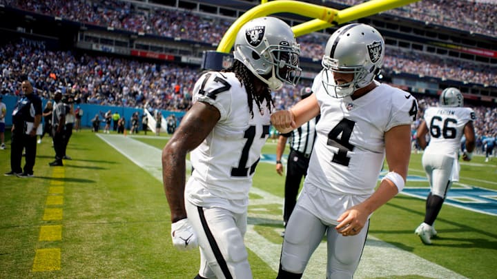 Las Vegas Raiders wide receiver Davante Adams (17) celebrates his touch down with quarterback Derek Carr (4) during the second quarter at Nissan Stadium Sunday, Sept. 25, 2022, in Nashville, Tenn.

Nfl Las Vegas Raiders At Tennessee Titans