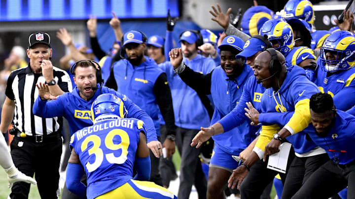Oct 20, 2024; Inglewood, California, USA; Los Angeles Rams head coach Sean McVay celebrates an interception by safety Jaylen McCollough (39) with the rest of the bench against the Las Vegas Raiders in the second half at SoFi Stadium. Mandatory Credit: Alex Gallardo-Imagn Images
