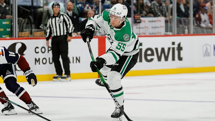 Oct 11, 2025; Denver, Colorado, USA; Dallas Stars defenseman Thomas Harley (55) attempts a shot in the first period against the Colorado Avalanche at Ball Arena. Mandatory Credit: Isaiah J. Downing-Imagn Images