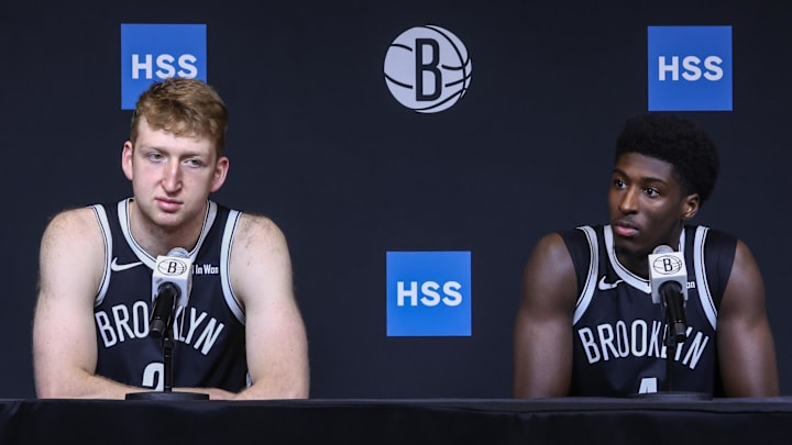 Sep 23, 2025; Brooklyn, NY, USA;  Brooklyn Nets forward Danny Wolf (2) and guard Drake Powell (4) speak at Media Day. Mandatory Credit: Wendell Cruz-Imagn Images