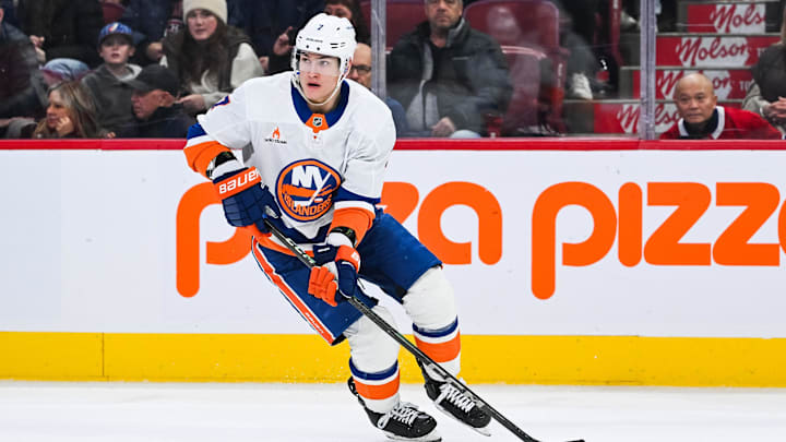 Dec 3, 2024; Montreal, Quebec, CAN; New York Islanders right wing Maxim Tsyplakov (7) plays the puck against the Montreal Canadiens during the first period at Bell Centre. Mandatory Credit: David Kirouac-Imagn Images