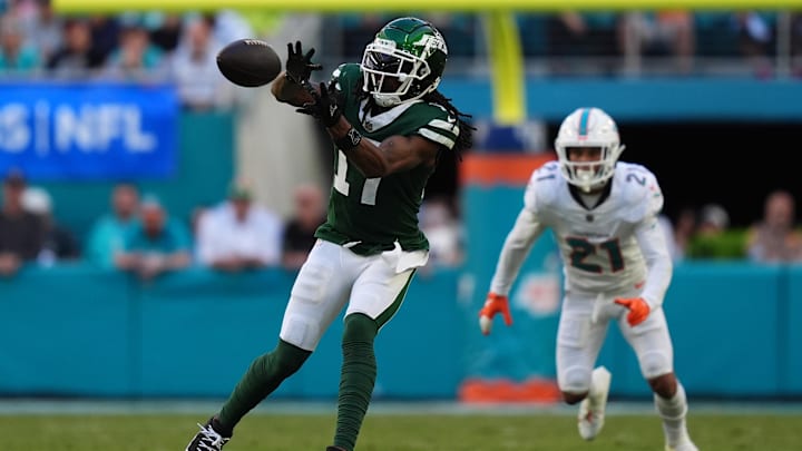 Dec 8, 2024; Miami Gardens, Florida, USA; New York Jets wide receiver Davante Adams (17) makes a catch against the Miami Dolphins  during the second half at Hard Rock Stadium. 