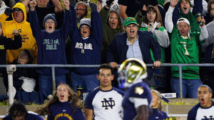 Fans celebrates a touchdown scored by Notre Dame running back Jeremiyah Love (4) during a NCAA college football game against Virginia at Notre Dame Stadium on Saturday, Nov. 16, 2024, in South Bend. Fans celebrates a touchdown scored by Notre Dame running back Jeremiyah Love (4) during a NCAA college football game against Virginia at Notre Dame Stadium on Saturday, Nov. 16, 2024, in South Bend.