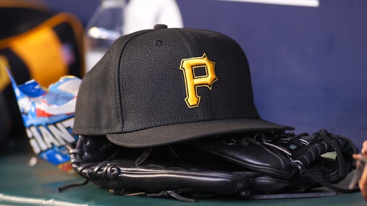 Sep 8, 2023; Atlanta, Georgia, USA; A detailed view of a Pittsburgh Pirates hat and glove before a game against the Pittsburgh Pirates in the first inning at Truist Park. Mandatory Credit: Brett Davis-Imagn Images Sep 8, 2023; Atlanta, Georgia, USA; A detailed view of a Pittsburgh Pirates hat and glove before a game against the Pittsburgh Pirates in the first inning at Truist Park. Mandatory Credit: Brett Davis-Imagn Images