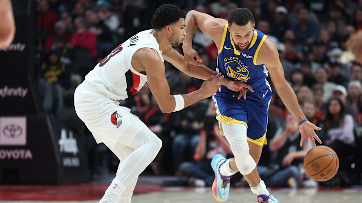 Oct 24, 2025; Portland, Oregon, USA; Golden State Warriors guard Stephen Curry (30) dribbles the ball past Portland Trail Blazers forward Toumani Camara (33) in the first half at Moda Center. Mandatory Credit: Jaime Valdez-Imagn Images Oct 24, 2025; Portland, Oregon, USA; Golden State Warriors guard Stephen Curry (30) dribbles the ball past Portland Trail Blazers forward Toumani Camara (33) in the first half at Moda Center. Mandatory Credit: Jaime Valdez-Imagn Images