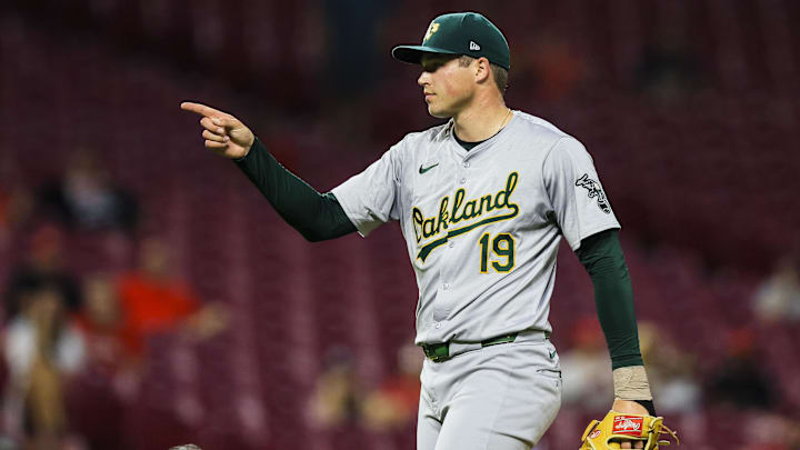 Aug 28, 2024; Cincinnati, Ohio, USA; Oakland Athletics relief pitcher Mason Miller (19) reacts after the victory over the Cincinnati Reds at Great American Ball Park. Mandatory Credit: Katie Stratman-Imagn Images