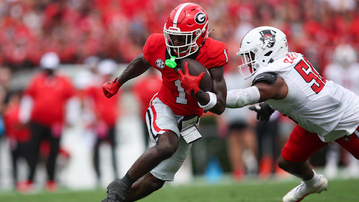 Sep 6, 2025; Athens, Georgia, USA; Georgia Bulldogs wide receiver Zachariah Branch (1) runs the ball against the Austin Peay Governors in the first quarter at Sanford Stadium. Mandatory Credit: Brett Davis-Imagn Images