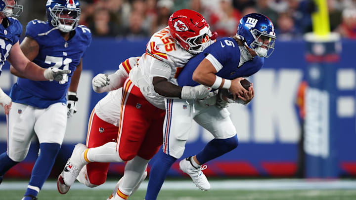 Sep 21, 2025; East Rutherford, New Jersey, USA; New York Giants quarterback Jaxson Dart (6) runs against Kansas City Chiefs defensive tackle Omarr Norman-Lott (55) in the third quarter at MetLife Stadium. Mandatory Credit: Vincent Carchietta-Imagn Images