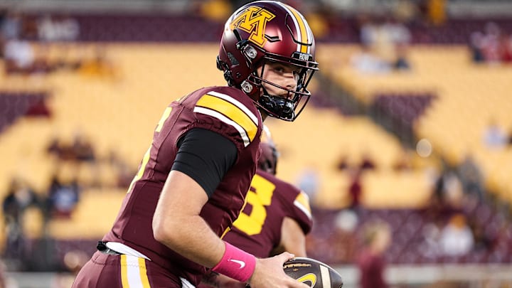Oct 17, 2025; Minneapolis, Minnesota, USA; Minnesota Golden Gophers quarterback Drake Lindsey (5) warms up before the game against the Nebraska Cornhuskers at Huntington Bank Stadium. Mandatory Credit: Matt Krohn-Imagn Images