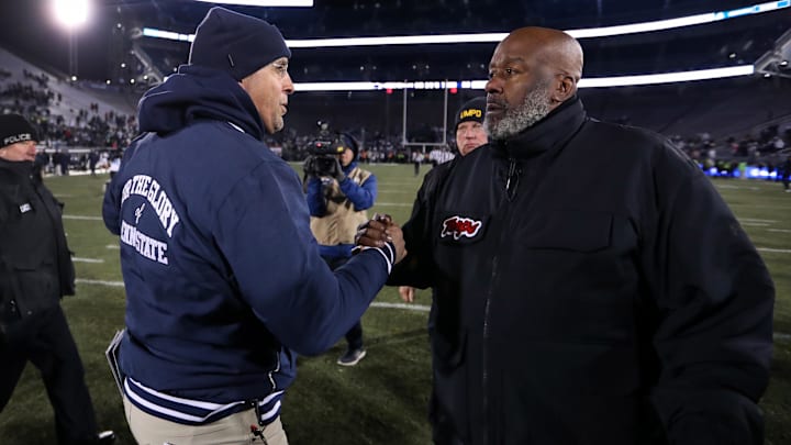 Penn State Nittany Lions head coach James Franklin (left) shakes hands at midfield with Maryland Terrapins head coach Michael Locksley 