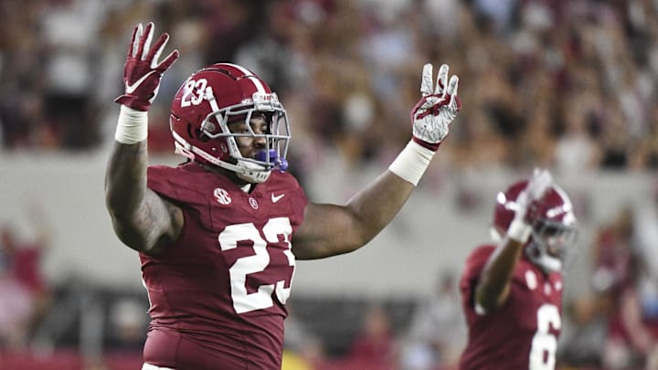 Aug 31, 2024; Tuscaloosa, Alabama, USA;  Alabama Crimson Tide defensive lineman James Smith (23) holds up four fingers on each hand as the games moves to the fourth quarter at Bryant-Denny Stadium during the game between the Alabama Crimson Tide and the Western Kentucky Hilltoppers. Alabama defeated Western Kentucky 63-0. 