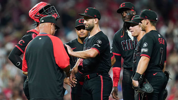 Cincinnati Reds pitcher Nick Martinez (28) pats Cincinnati Reds manager Terry Francona (77) before leaving the pitches mound in the eighth inning of a MLB game between the Cincinnati Reds and San Diego Padres, Friday, June 27, 2025, at Great American Ball Park in Downtown Cincinnati. Reds won 8-1. Cincinnati Reds pitcher Nick Martinez (28) pats Cincinnati Reds manager Terry Francona (77) before leaving the pitches mound in the eighth inning of a MLB game between the Cincinnati Reds and San Diego Padres, Friday, June 27, 2025, at Great American Ball Park in Downtown Cincinnati. Reds won 8-1.