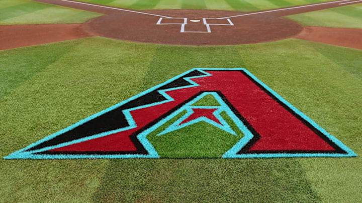 Apr 16, 2024; Phoenix, Arizona, USA; General view of the Arizona Diamondbacks logo on the field prior to the game against the Chicago Cubs at Chase Field. Mandatory Credit: Matt Kartozian-Imagn Images