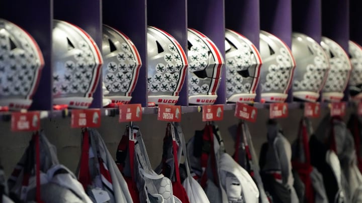 Nov 5, 2022; Evanston, Illinois, USA; Ohio State Buckeyes helmets and uniforms hang in the locker room prior to the NCAA football game between the Northwestern Wildcats and the Ohio State Buckeyes at Ryan Field. Mandatory Credit: Adam Cairns-The Columbus Dispatch

Ncaa Football Ohio State Buckeyes At Northwestern Wildcats