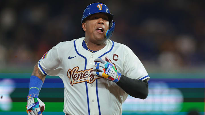 Mar 7, 2026; Miami, FL, United States; Venezuela catcher Salvador Perez (13) runs toward third base against Israel during the eighth inning at loanDepot Park. Mandatory Credit: Sam Navarro-Imagn Images