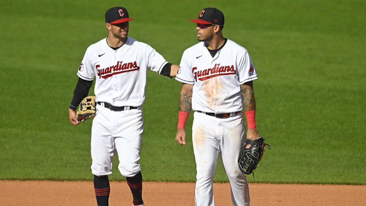 Aug 18, 2023; Cleveland, Ohio, USA; Cleveland Guardians second baseman Tyler Freeman (left) and first baseman Gabriel Arias (13) stand on the field fifth inning against the Detroit Tigers at Progressive Field. Mandatory Credit: David Richard-Imagn Images