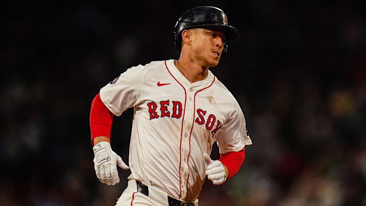 Sep 9, 2024; Boston, Massachusetts, USA; Boston Red Sox right fielder Rob Refsnyder (30) hits a home run against the Baltimore Orioles in the eighth inning at Fenway Park. Sep 9, 2024; Boston, Massachusetts, USA; Boston Red Sox right fielder Rob Refsnyder (30) hits a home run against the Baltimore Orioles in the eighth inning at Fenway Park.