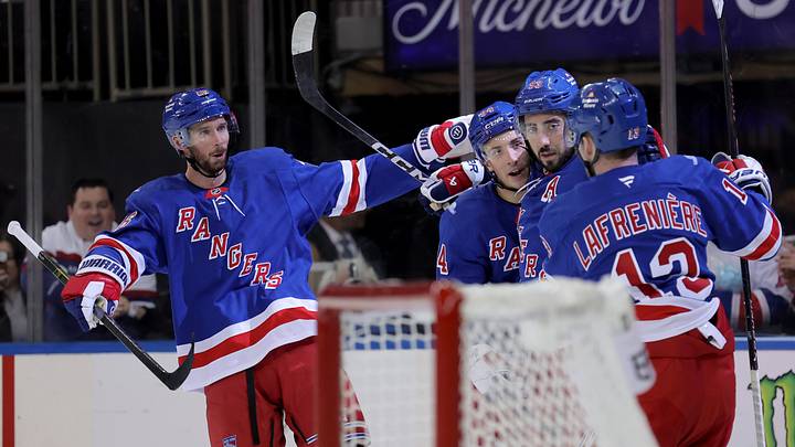 Oct 19, 2026; New York, New York, USA; New York Rangers right wing Gabe Perreault (94) celebrates his goal against the Anaheim Ducks with defenseman Marcus Pettersson (26) and center Mika Zibanejad (93) and left wing Alexis Lafreniere (13) during the second period at Madison Square Garden. Mandatory Credit: Brad Penner-Imagn Images