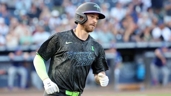 Tampa Bay Rays second base Brandon Lowe (8) hits a home run during the third inning against the Toronto Blue Jays.